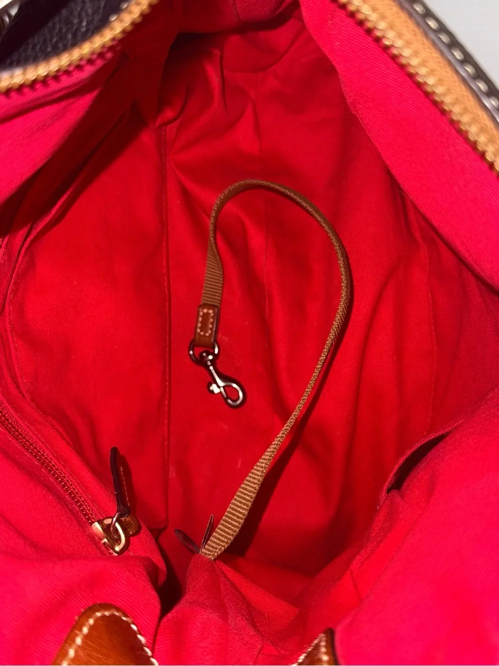 Dooney & Bourke Black with Brown Trim Pebbled Leather Satchel
